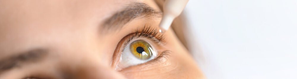 Woman,Applying,Eye,Drop.,Vitamin,Drops,From,Tiredness,And,Redness